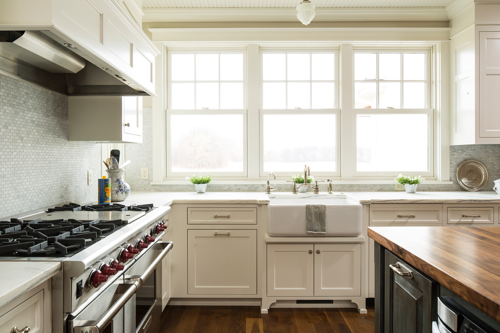 Inspiration for a cottage kitchen remodel in Minneapolis with a farmhouse sink and marble countertops