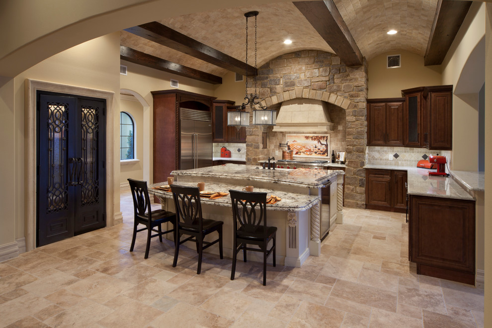 Huge tuscan u-shaped eat-in kitchen photo in Orlando with shaker cabinets, dark wood cabinets, multicolored backsplash, stainless steel appliances and an island