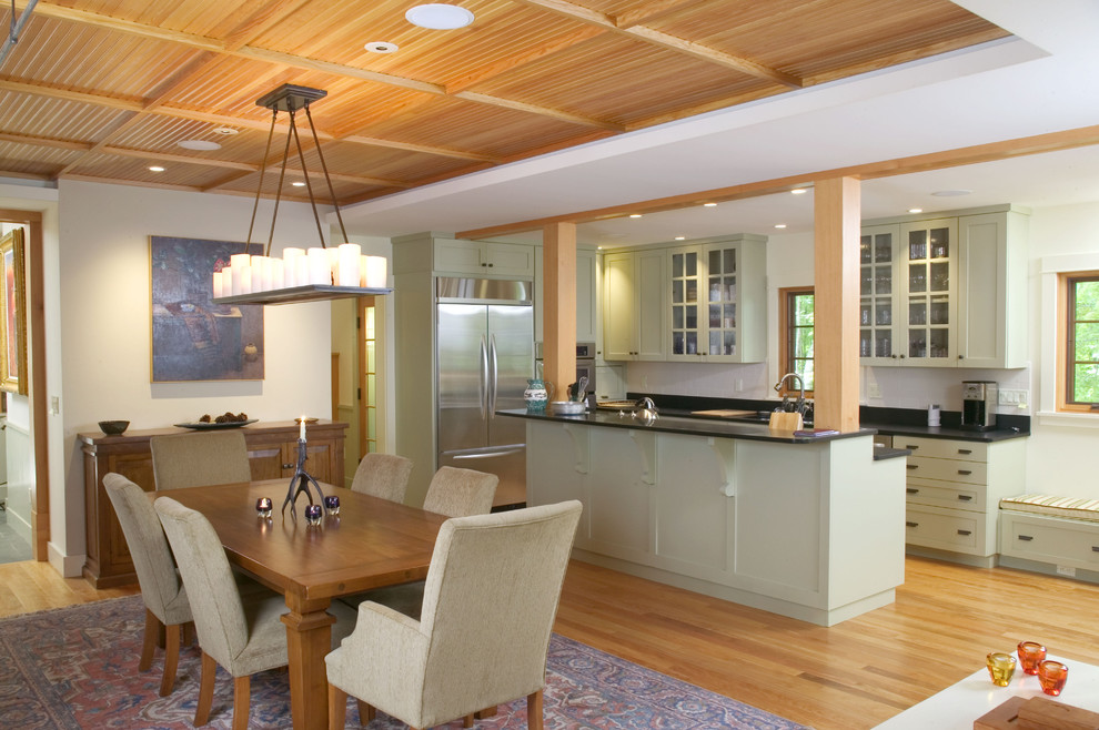 Photo of a classic galley kitchen/diner in Boston with stainless steel appliances.