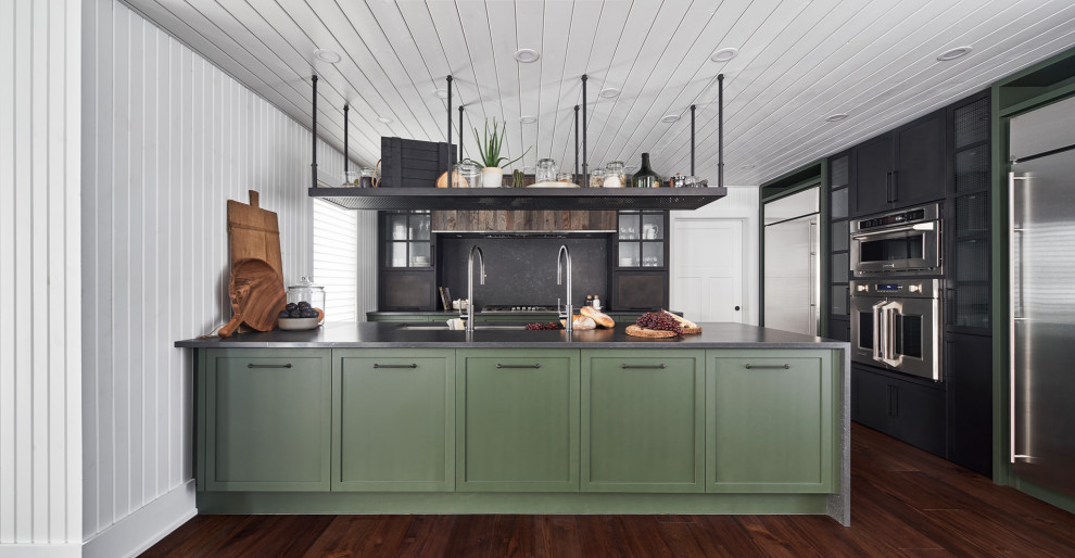 Inspiration for a rustic l-shaped kitchen in Ottawa with a submerged sink, shaker cabinets, black cabinets, black splashback, stone slab splashback, stainless steel appliances, dark hardwood flooring, a breakfast bar, brown floors, grey worktops and a timber clad ceiling.