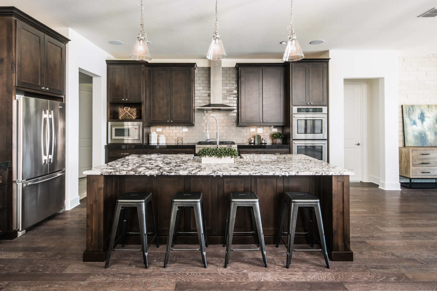 Modern Kitchen with Glass Door Cabinets and Dark Beige Backsplash