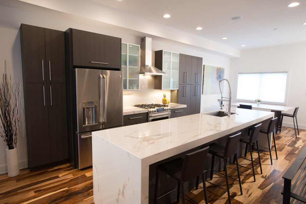 Example of a trendy kitchen design in Philadelphia with tile countertops and porcelain backsplash