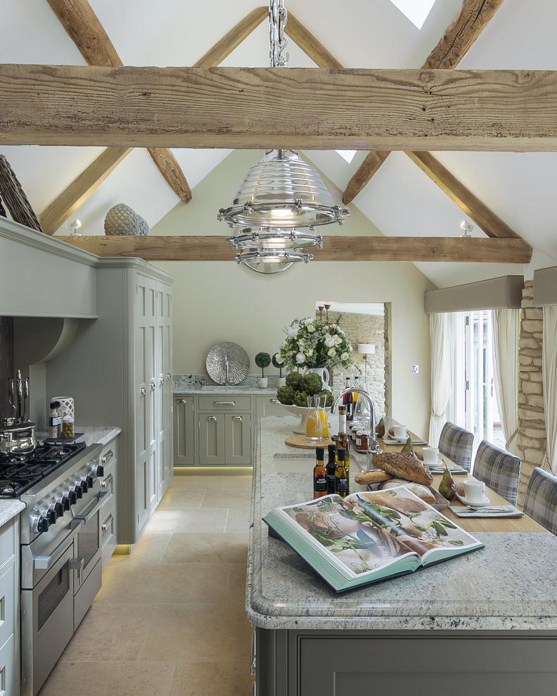 Design ideas for a medium sized rural l-shaped kitchen in Berkshire with shaker cabinets, grey cabinets, an island, beige floors, a submerged sink, stainless steel appliances and grey worktops.