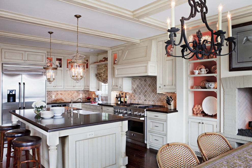 Inspiration for a timeless kitchen remodel in Los Angeles with beaded inset cabinets, stainless steel appliances and white cabinets