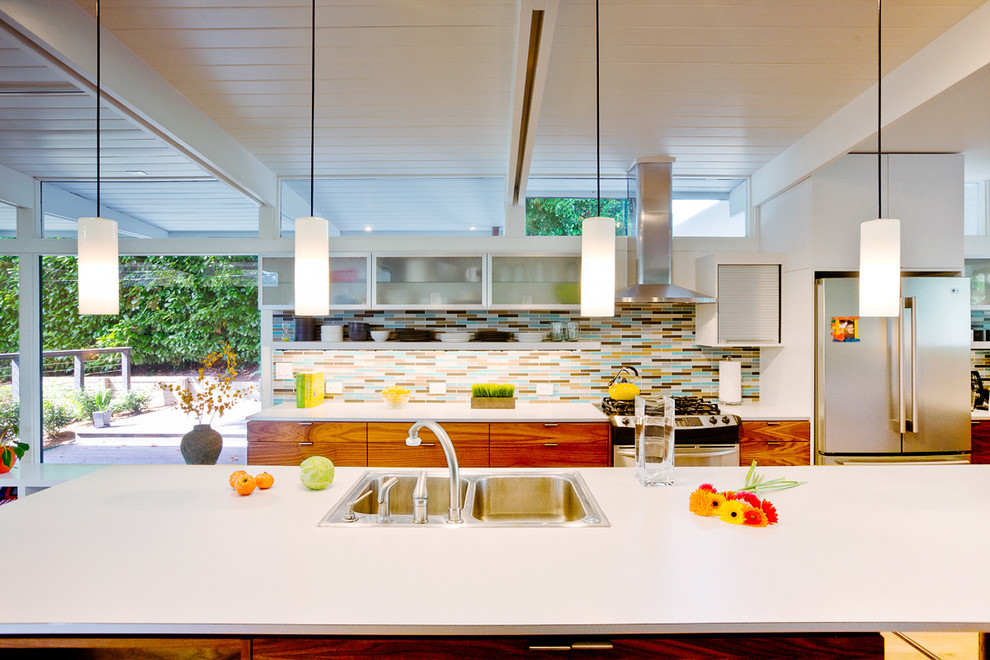Kitchen - 1950s kitchen idea in Seattle with stainless steel appliances