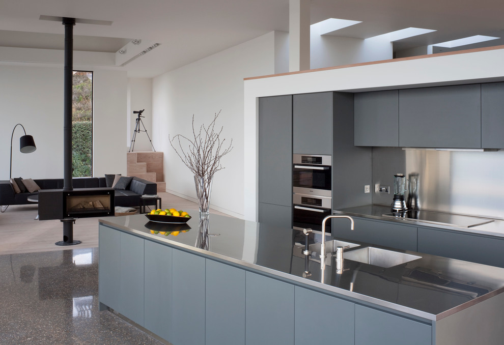 Example of a beach style kitchen design in Channel Islands