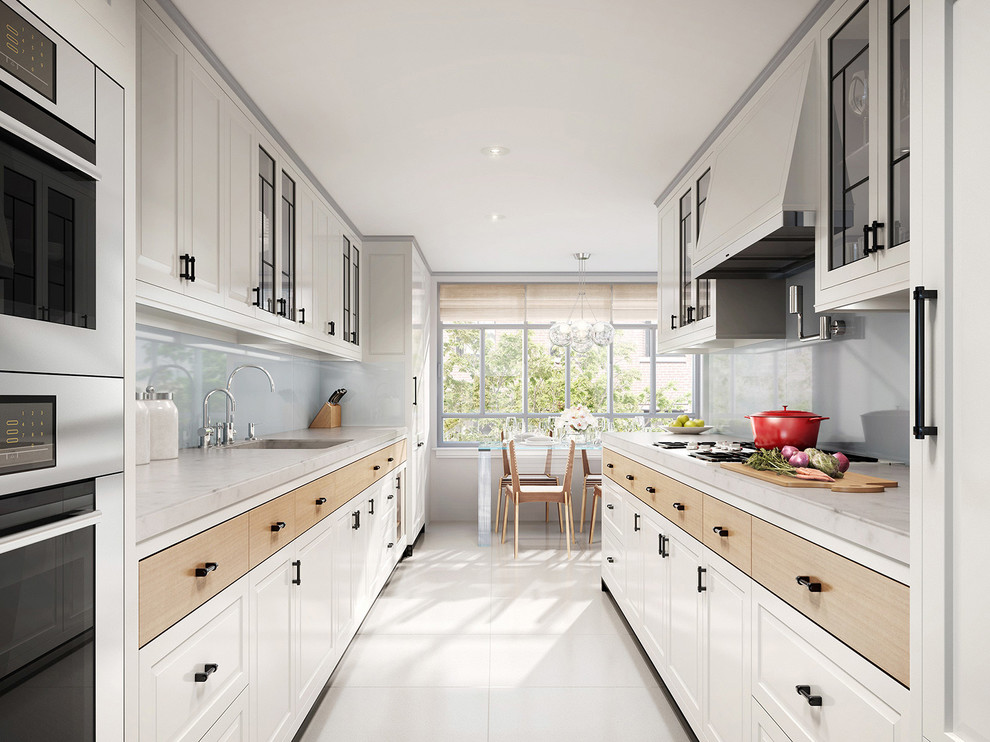Contemporary galley kitchen in Toronto with an integrated sink, raised-panel cabinets, white cabinets, grey splashback and stainless steel appliances.
