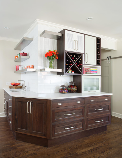 Premium RTA cabinets Canada – brown wood shaker cabinets with white marble countertops, open shelves and wine racks, white tile in a modern space.