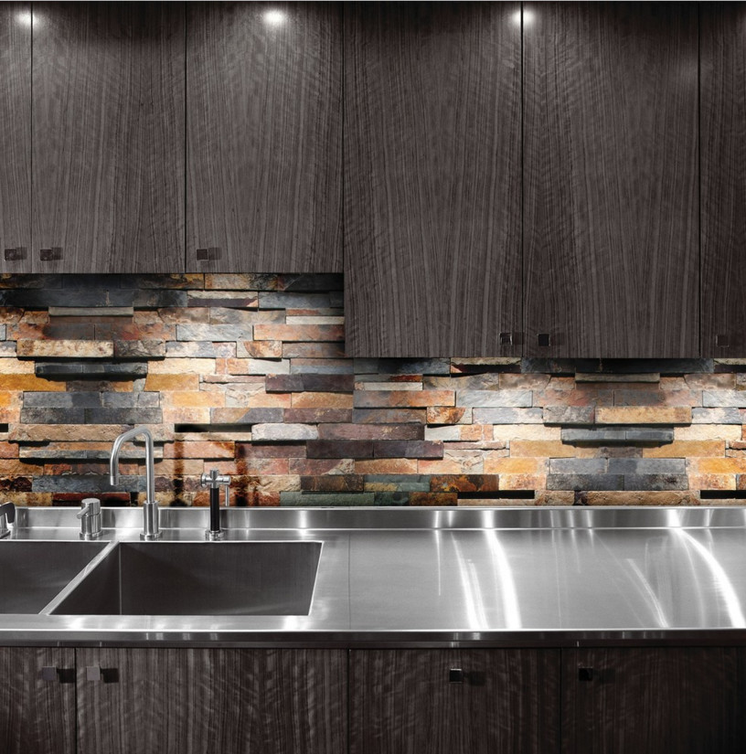 Design ideas for a medium sized modern single-wall kitchen in Toronto with stainless steel worktops, orange splashback and stone tiled splashback.