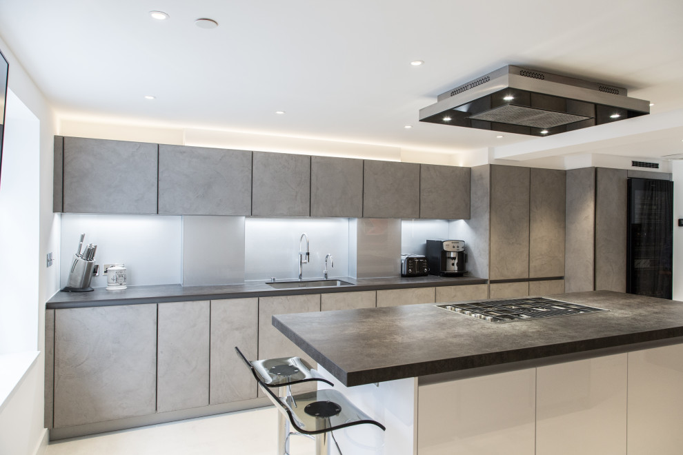 This is an example of a medium sized contemporary kitchen in London.