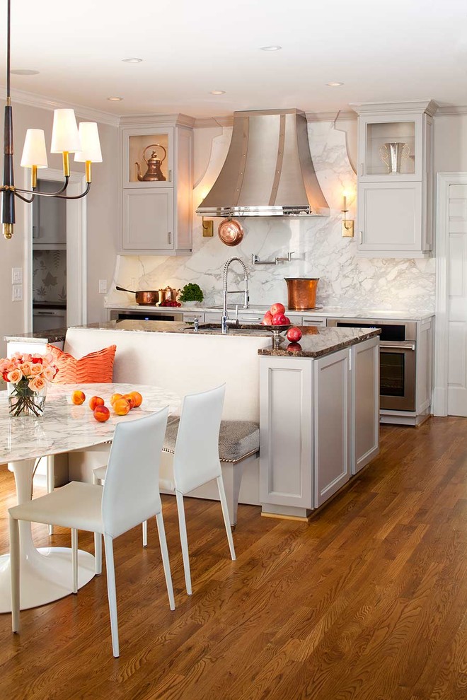 Example of a transitional kitchen design in Atlanta with stainless steel appliances