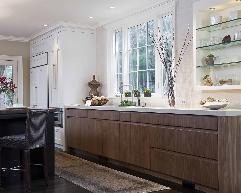 Elegant kitchen photo in Boston with open cabinets, quartz countertops and paneled appliances