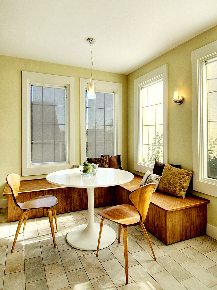 Example of an eclectic eat-in kitchen design in Seattle with medium tone wood cabinets
