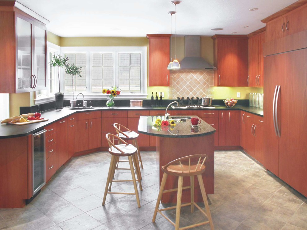 Example of a mid-sized minimalist u-shaped terra-cotta tile enclosed kitchen design in Boston with an undermount sink, red cabinets, flat-panel cabinets, granite countertops, beige backsplash, ceramic backsplash, paneled appliances and an island