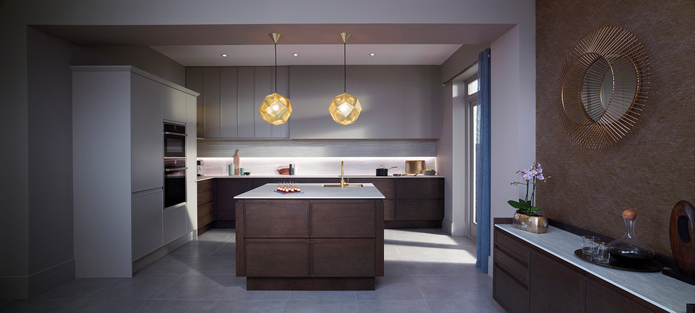 Photo of a large contemporary l-shaped open plan kitchen in Dublin with a built-in sink, flat-panel cabinets, dark wood cabinets, quartz worktops, wood splashback, integrated appliances, ceramic flooring and an island.
