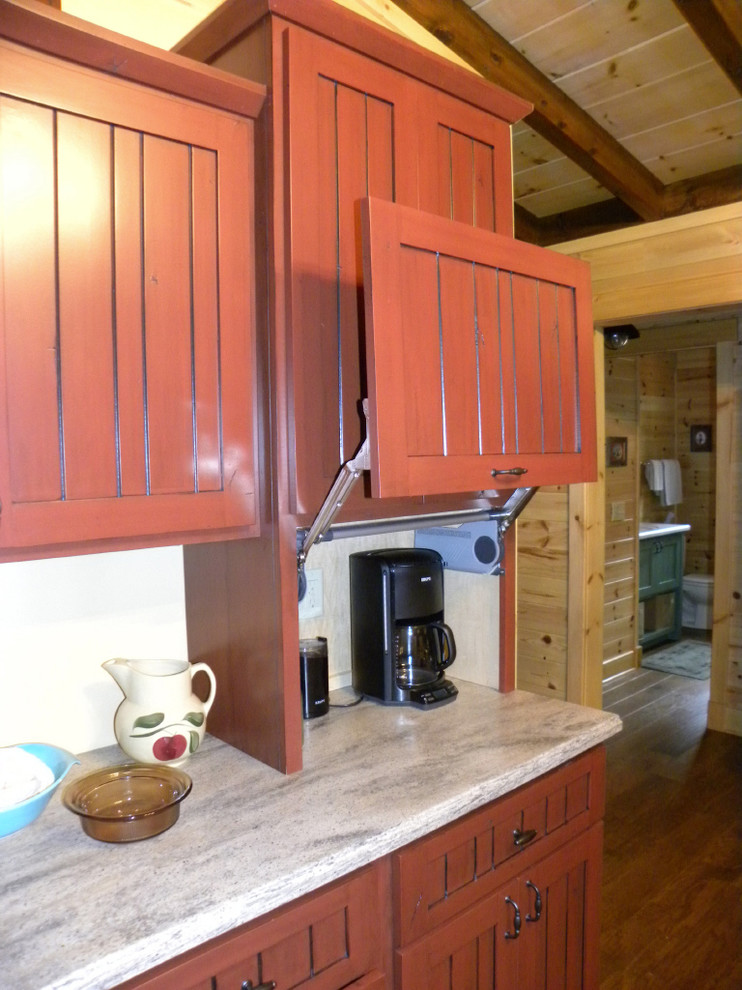Country u-shaped kitchen in Other.