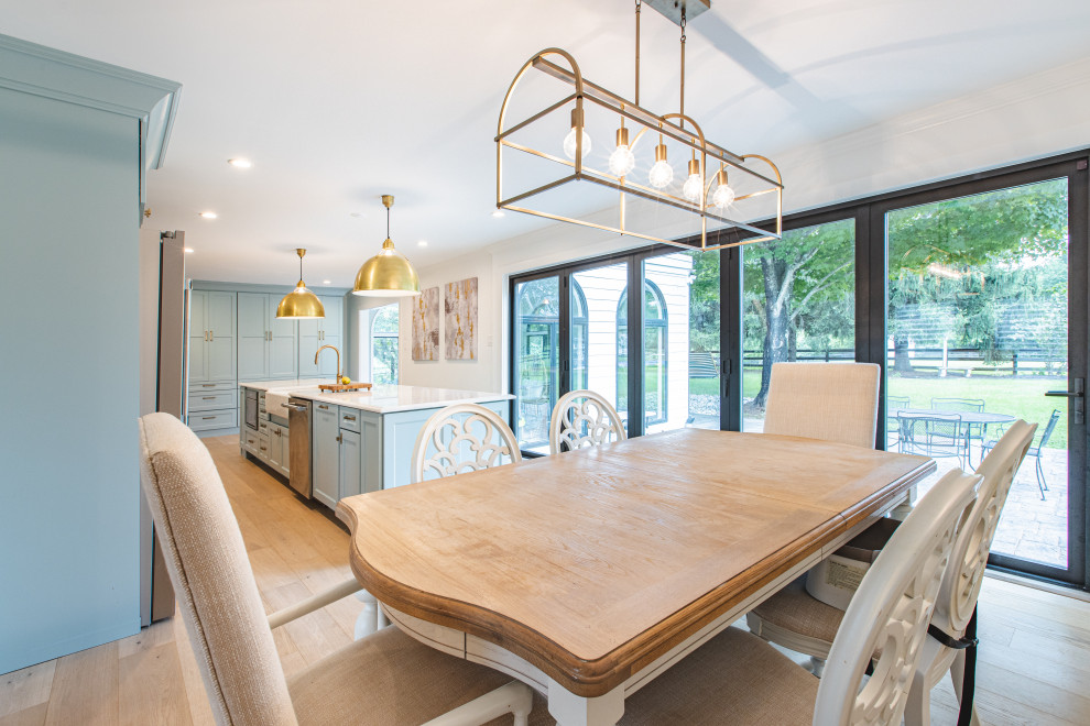 Kitchen/dining room combo - large farmhouse light wood floor and beige floor kitchen/dining room combo idea in DC Metro