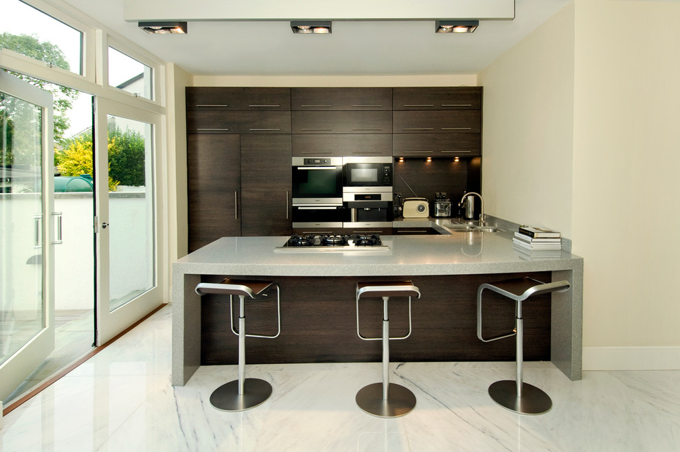 Design ideas for a contemporary kitchen in Limerick with stainless steel appliances.