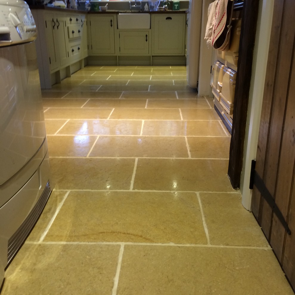 Inspiration for a cottage limestone floor kitchen remodel in Other