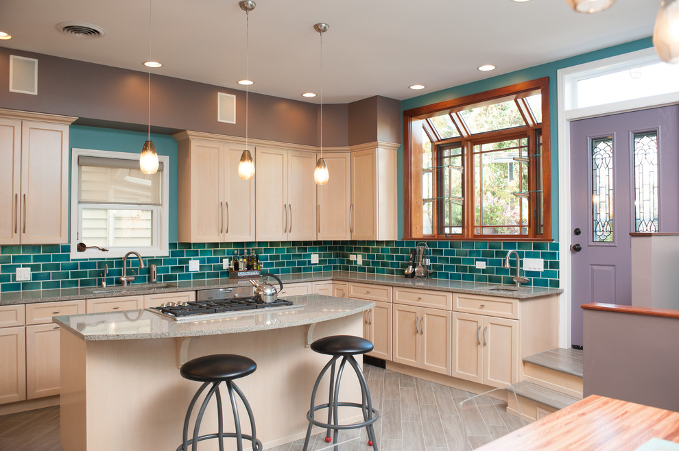 Transitional u-shaped eat-in kitchen photo in Chicago with an undermount sink, shaker cabinets, light wood cabinets, subway tile backsplash and stainless steel appliances