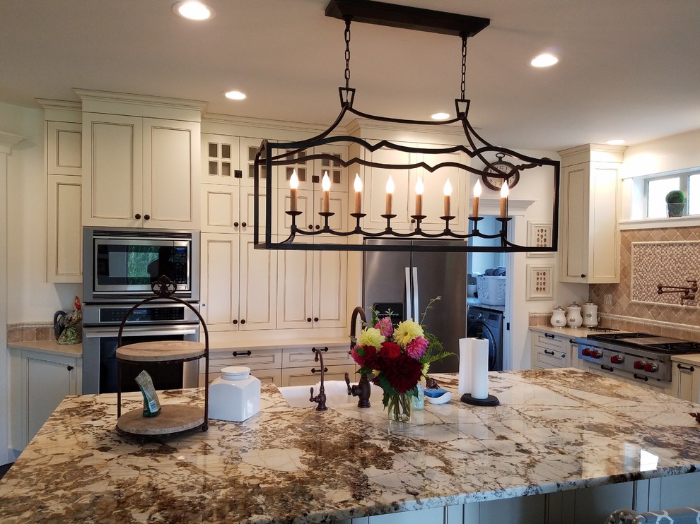 Linear Island Lighting Transitional Kitchen Seattle by Luxe