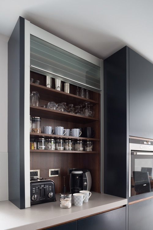 Dark Blue Contemporary Kitchen with Storage Cabinet Solutions and Handless Design