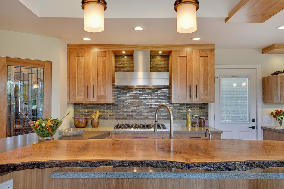 Trendy kitchen photo in San Francisco with shaker cabinets, medium tone wood cabinets and multicolored backsplash