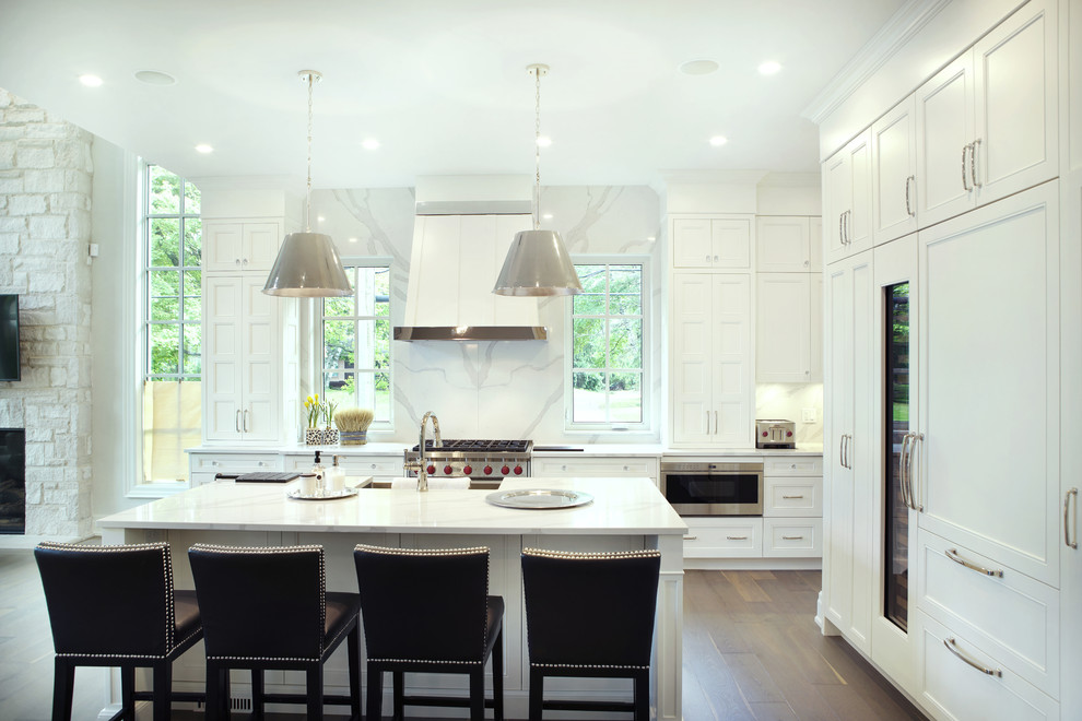 Large transitional l-shaped dark wood floor open concept kitchen photo in Toronto with recessed-panel cabinets, white cabinets, white backsplash, porcelain backsplash, an island and white countertops