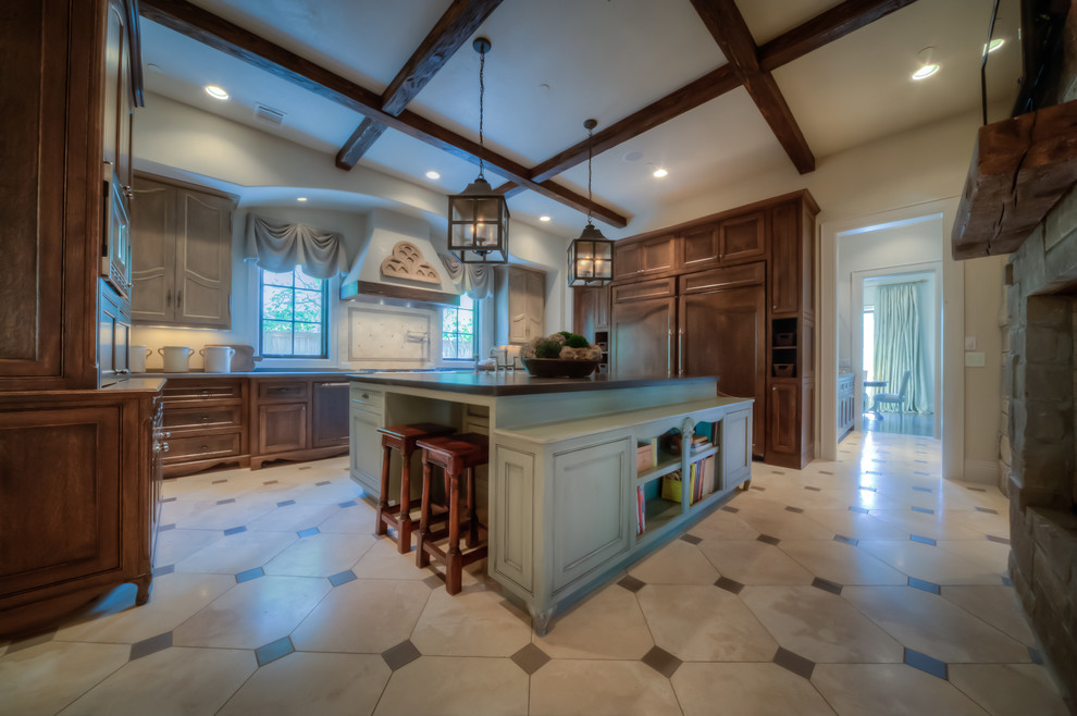 Example of a large classic single-wall marble floor and white floor eat-in kitchen design in Houston with raised-panel cabinets, brown cabinets, concrete countertops, white backsplash, mosaic tile backsplash, an island, gray countertops, a farmhouse sink and stainless steel appliances
