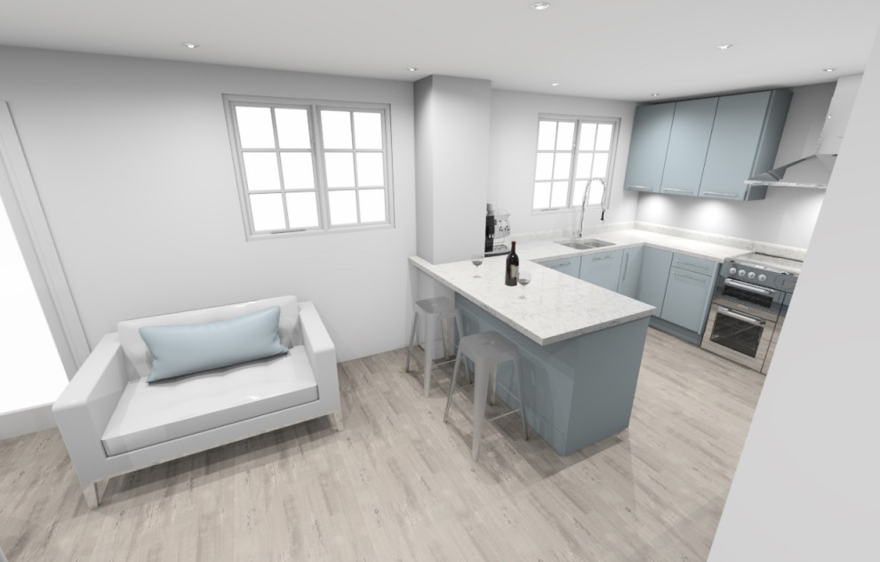Bild på ett litet funkis vit vitt kök, med en integrerad diskho, släta luckor, blå skåp, bänkskiva i kvartsit, rostfria vitvaror, mellanmörkt trägolv, en halv köksö och grått golv