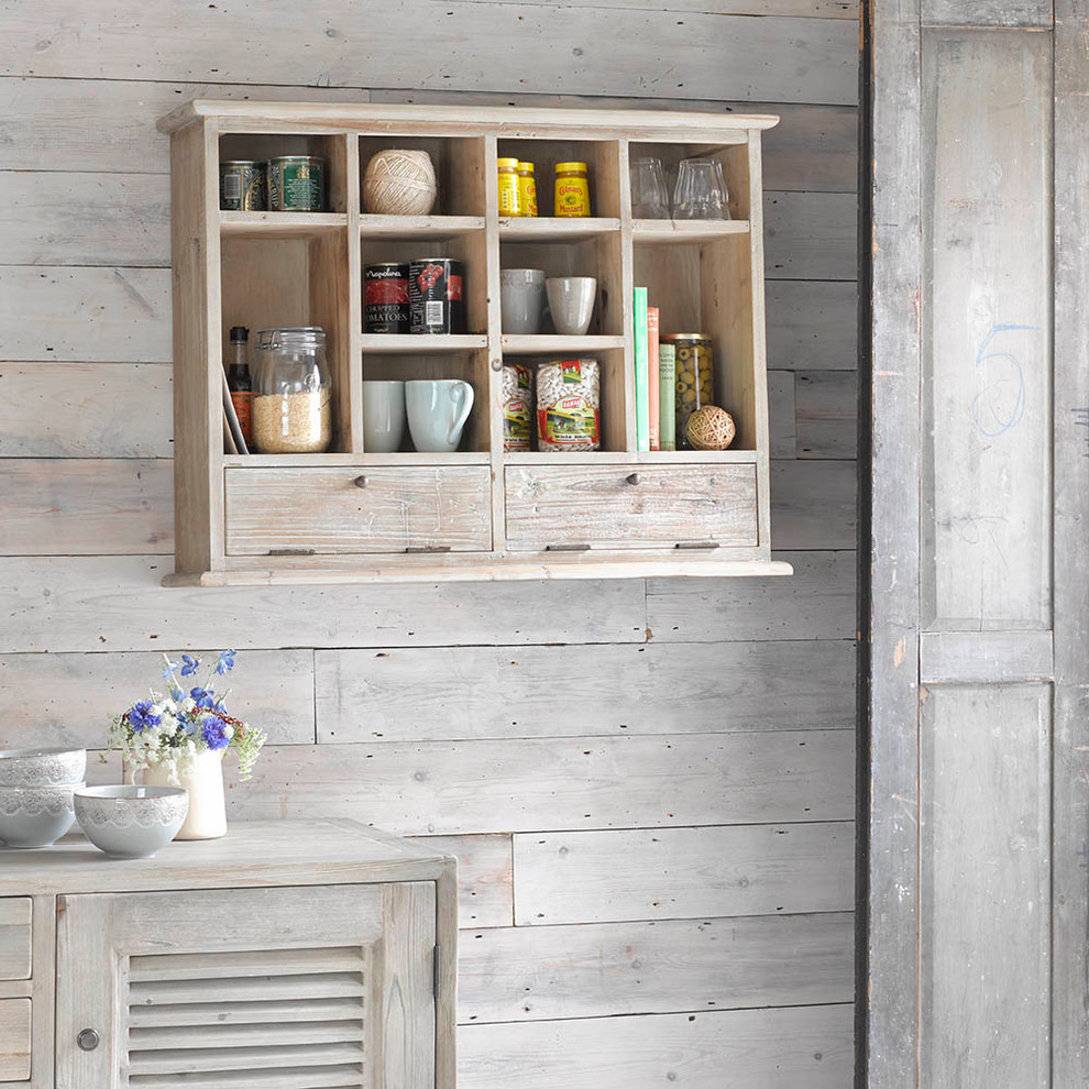 Inspiration for a medium sized contemporary kitchen pantry in London with distressed cabinets and wood worktops.
