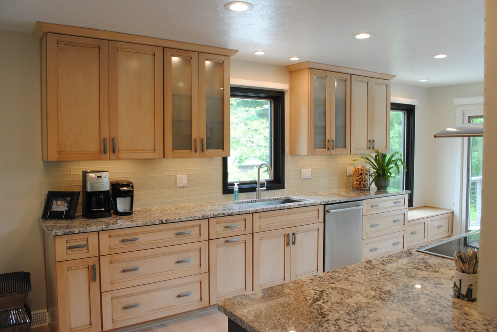 Mid-sized asian single-wall light wood floor eat-in kitchen photo in Cleveland with a single-bowl sink, shaker cabinets, light wood cabinets, granite countertops, white backsplash, subway tile backsplash, stainless steel appliances and an island