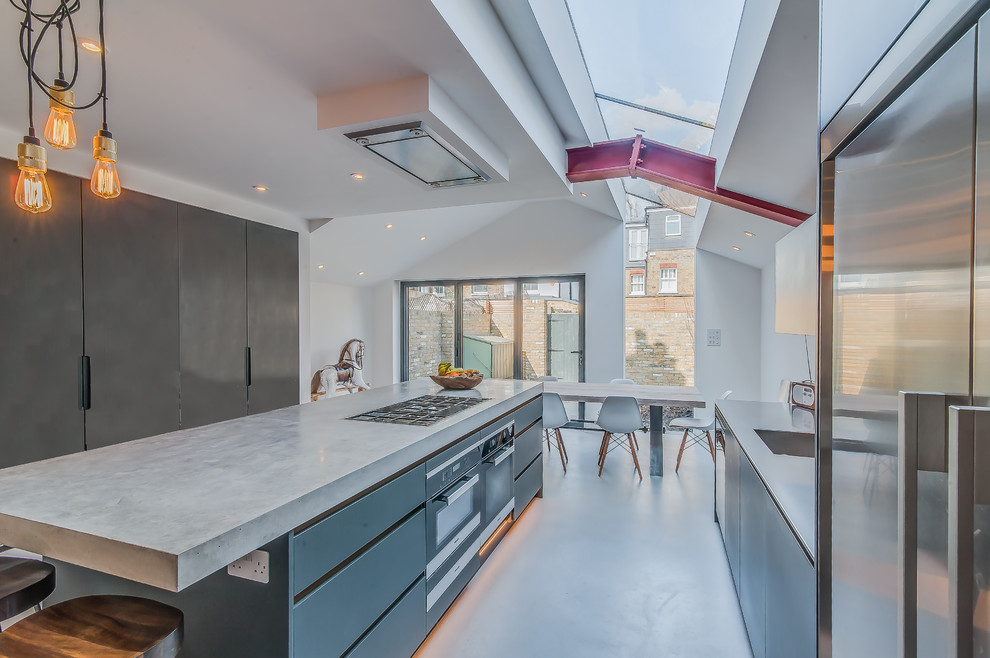This is an example of a contemporary kitchen in Surrey.