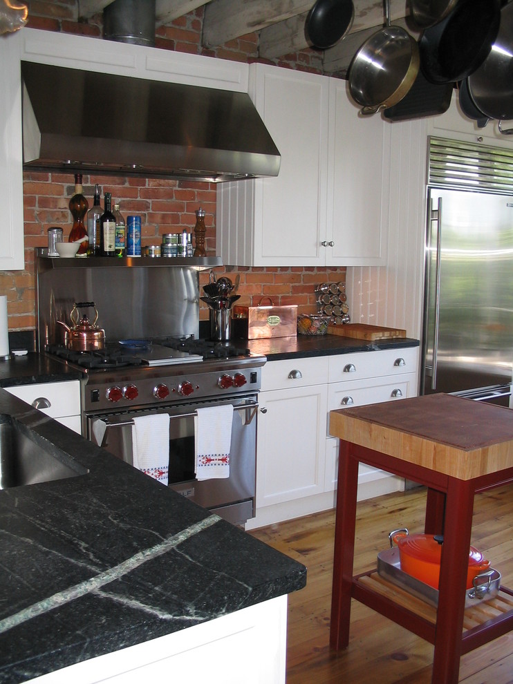 Inspiration for a timeless kitchen remodel in Boston with soapstone countertops