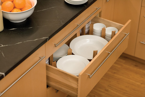 Pull-out pantry and spice rack organizers in modern kitchen