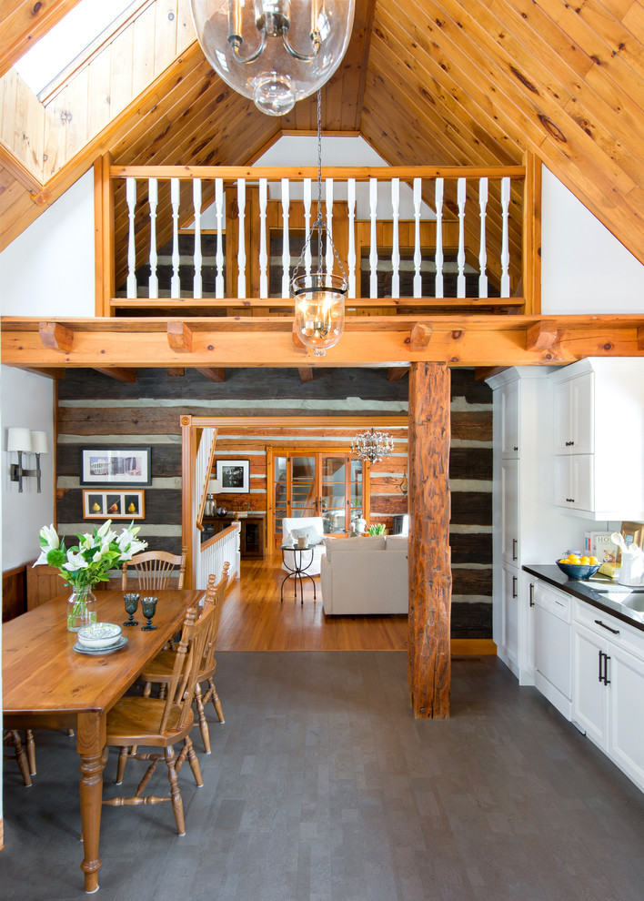 Inspiration for a rustic l-shaped gray floor eat-in kitchen remodel in Toronto with recessed-panel cabinets, white cabinets and white appliances
