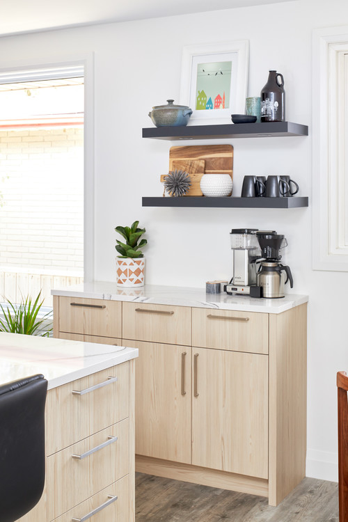 Warmth and Functionality: Wood Cabinets, White Countertop, and Black Floating Shelves - Kitchen Coffee Bar Ideas