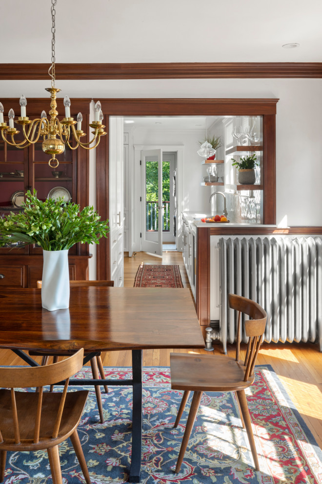 Design ideas for a medium sized classic dining room in Boston with medium hardwood flooring.