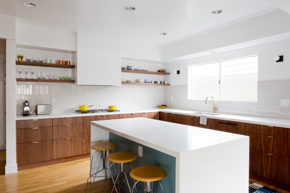 Example of a trendy l-shaped light wood floor kitchen design in Los Angeles with a single-bowl sink, medium tone wood cabinets, beige backsplash, an island and open cabinets