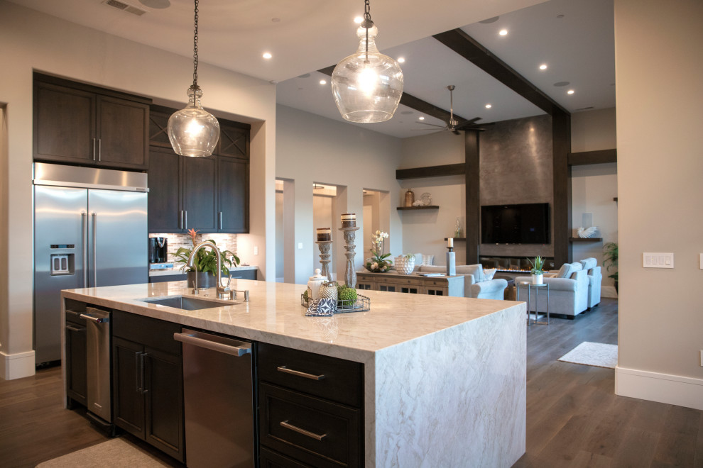 Expansive contemporary kitchen in Sacramento with quartz worktops, stainless steel appliances and beige worktops.