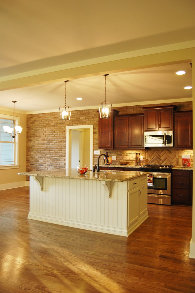 Example of an arts and crafts kitchen design in Raleigh