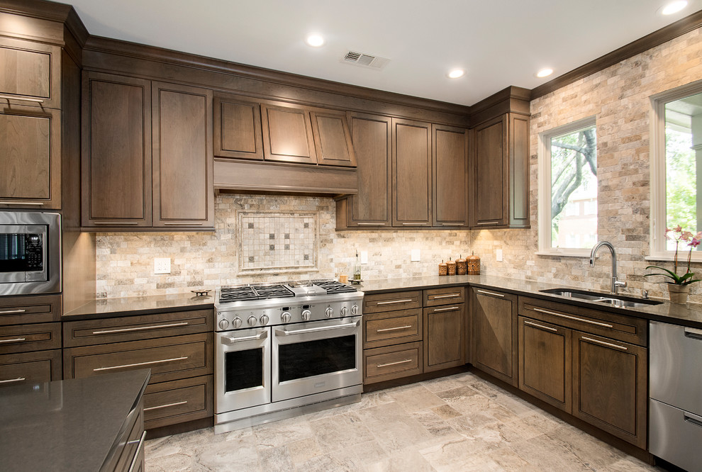 Inspiration for a mid-sized timeless l-shaped travertine floor and beige floor kitchen pantry remodel in Dallas with an undermount sink, beaded inset cabinets, quartz countertops, beige backsplash, stainless steel appliances, dark wood cabinets, mosaic tile backsplash and a peninsula