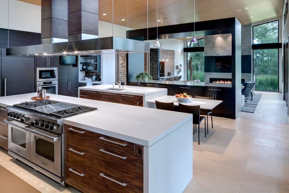 Inspiration for a contemporary open plan kitchen in Dallas with a submerged sink, flat-panel cabinets and integrated appliances.