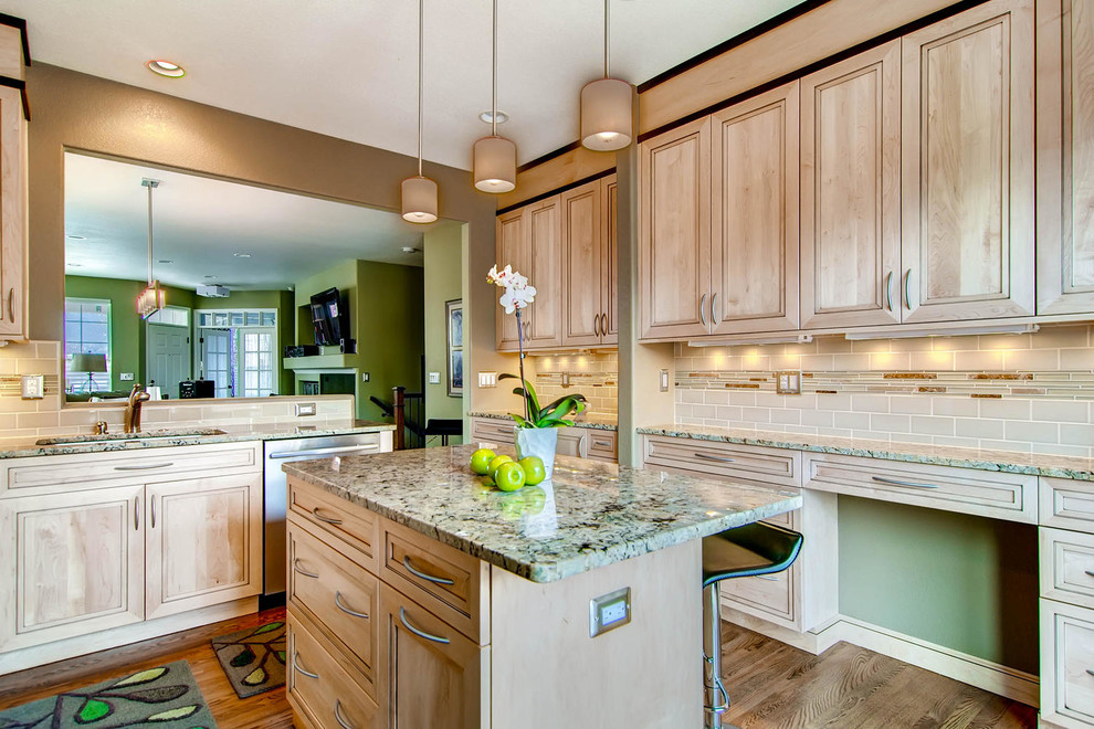 Example of a mid-sized transitional u-shaped dark wood floor kitchen pantry design in Denver with an undermount sink, flat-panel cabinets, light wood cabinets, granite countertops, beige backsplash, glass tile backsplash, stainless steel appliances and an island