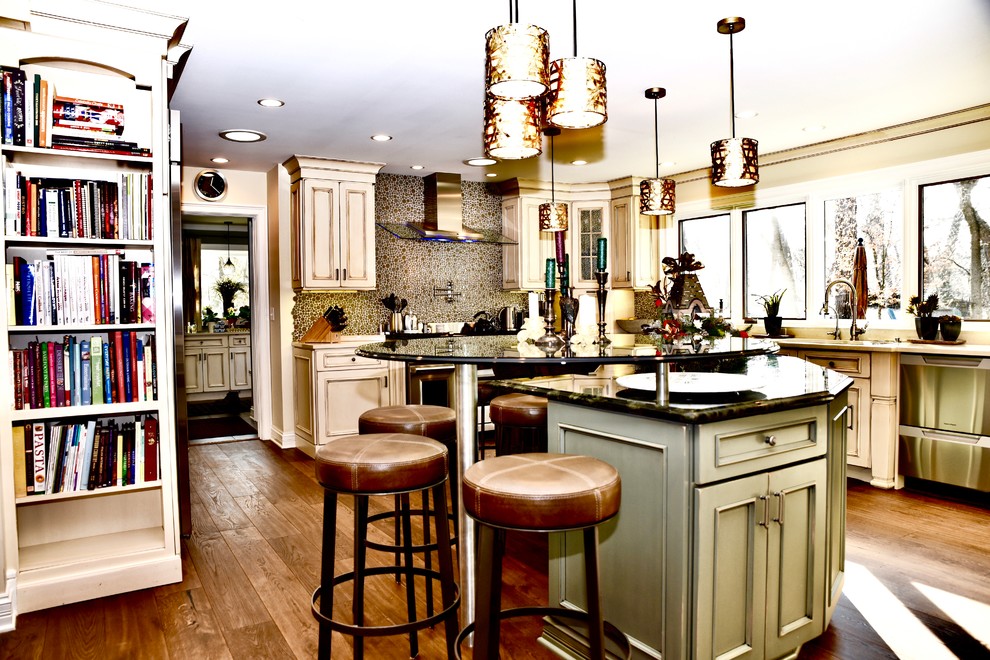 Eat-in kitchen - large transitional u-shaped dark wood floor and brown floor eat-in kitchen idea in Chicago with a double-bowl sink, beaded inset cabinets, distressed cabinets, quartzite countertops, green backsplash, glass tile backsplash, stainless steel appliances, an island and beige countertops