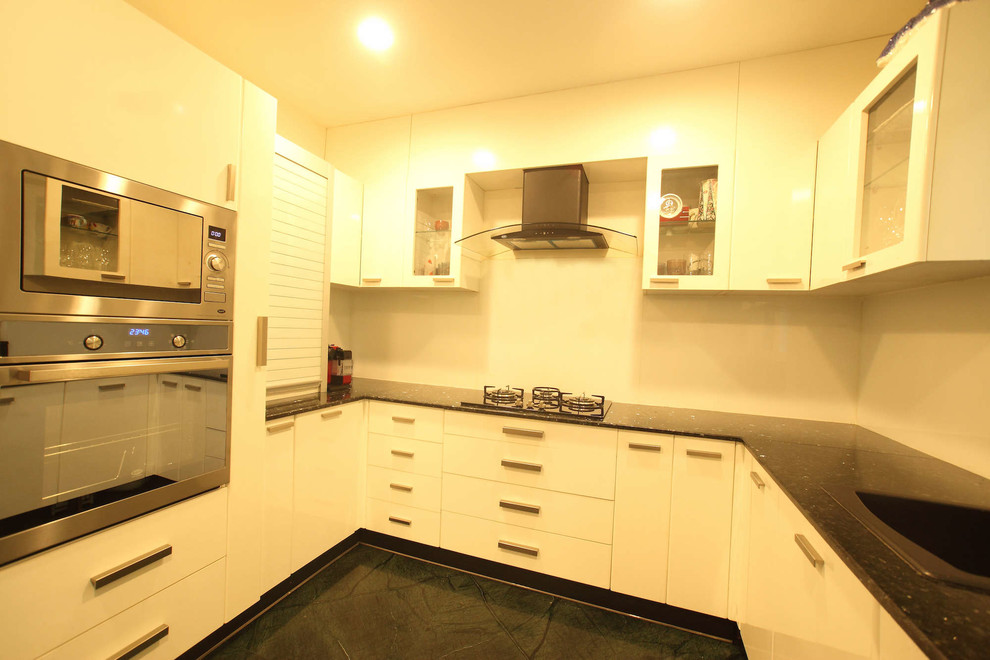 Design ideas for a shabby-chic style kitchen in Chennai.