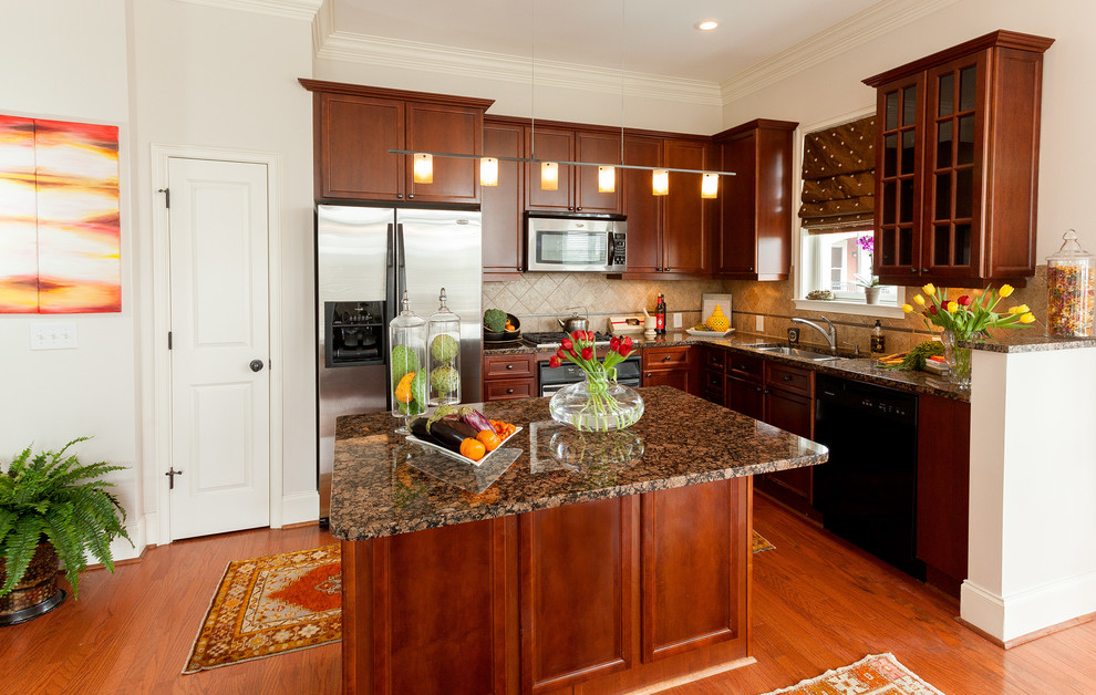 Photo of a medium sized traditional u-shaped open plan kitchen in Atlanta with a double-bowl sink, medium wood cabinets, granite worktops, ceramic splashback, stainless steel appliances, medium hardwood flooring and an island.