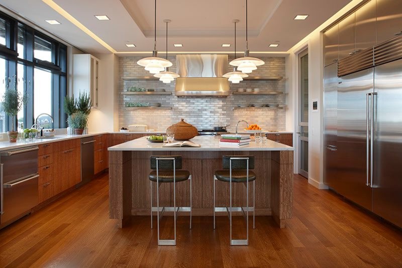 Example of a trendy dark wood floor open concept kitchen design in Detroit with stainless steel appliances and an island