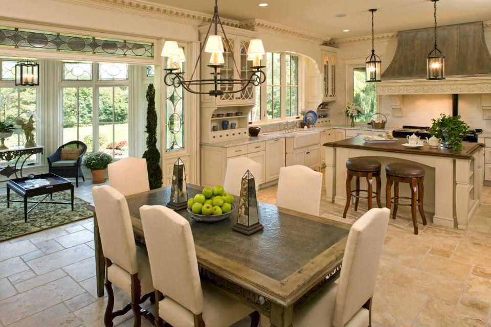 Eat-in kitchen - large traditional l-shaped ceramic tile eat-in kitchen idea in Chicago with a double-bowl sink, raised-panel cabinets, white cabinets, white backsplash, an island, stainless steel appliances, granite countertops and stone tile backsplash