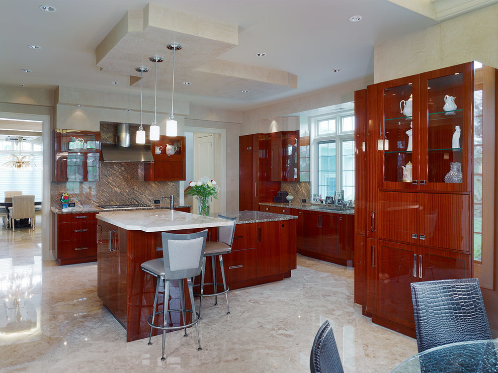 Inspiration for a large transitional galley marble floor eat-in kitchen remodel in Philadelphia with a drop-in sink, flat-panel cabinets, red cabinets, marble countertops, multicolored backsplash, ceramic backsplash, colored appliances and two islands